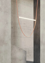 Load image into Gallery viewer, Parabola Belt Pendant | INSPIRA LIFESTYLES - Modern Minimalist Belt Pendant Lamp for high ceilings, Glass Tube Pendant Light, Creative LED Lighting Fixture, Living Room Pendant Light, Duplex Villa Pendant Lamp, Staircase Lighting Pendant, Minimalist Glass Tube Lamp, Contemporary LED Pendant Light, Elegant Belt Pendant Lamp, Stylish Modern Lighting, High-End Glass Pendant Light, Modern Living Room Illumination, Chic Duplex Villa Lamp, leather pendant light, industrial modern lighting