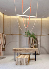 Load image into Gallery viewer, Parabola Belt Pendant | INSPIRA LIFESTYLES - Modern Minimalist Belt Pendant Lamp for high ceilings, Glass Tube Pendant Light, Creative LED Lighting Fixture, Living Room Pendant Light, Duplex Villa Pendant Lamp, Staircase Lighting Pendant, Minimalist Glass Tube Lamp, Contemporary LED Pendant Light, Elegant Belt Pendant Lamp, Stylish Modern Lighting, High-End Glass Pendant Light, Modern Living Room Illumination, Chic Duplex Villa Lamp, leather pendant light, industrial modern lighting