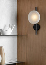 Load image into Gallery viewer, Inspira Lifestyles | Siro Wall Sconce with organic textured glass mounted on a brushed metal base. Modern sculptural wall lamp light fixture for residential or commercial interiors