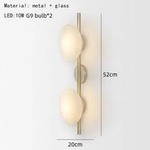 Load image into Gallery viewer, Inspira Lifestyles | Siro Wall Sconce with organic textured glass mounted on a brushed metal base. Modern sculptural wall lamp light fixture for residential or commercial interiors