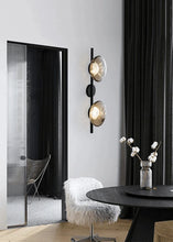 Load image into Gallery viewer, Inspira Lifestyles | Siro Wall Sconce with organic textured glass mounted on a brushed metal base. Modern sculptural wall lamp light fixture for residential or commercial interiors
