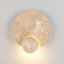 Load image into Gallery viewer, Inspira Lifestyles | Solace Travertine Wall Light – A natural travertine wall sconce designed to bring warmth, organic texture, and ambient lighting to contemporary interior spaces. Ideal as accent lighting in living rooms, bathrooms, stairwells, spas, and wellness-inspired environments. Natural stone wall lighting for both residential and commercial interiors.