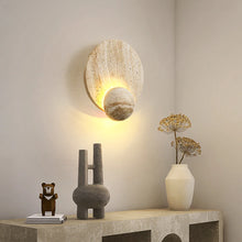 Load image into Gallery viewer, Inspira Lifestyles | Solace Travertine Wall Light – A natural travertine wall sconce designed to bring warmth, organic texture, and ambient lighting to contemporary interior spaces. Ideal as accent lighting in living rooms, bathrooms, stairwells, spas, and wellness-inspired environments. Natural stone wall lighting for both residential and commercial interiors.