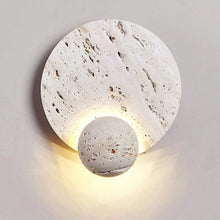 Load image into Gallery viewer, Inspira Lifestyles | Solace Travertine Wall Light – A natural travertine wall sconce designed to bring warmth, organic texture, and ambient lighting to contemporary interior spaces. Ideal as accent lighting in living rooms, bathrooms, stairwells, spas, and wellness-inspired environments. Natural stone wall lighting for both residential and commercial interiors.