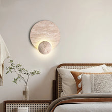 Load image into Gallery viewer, Inspira Lifestyles | Solace Travertine Wall Light – A natural travertine wall sconce designed to bring warmth, organic texture, and ambient lighting to contemporary interior spaces. Ideal as accent lighting in living rooms, bathrooms, stairwells, spas, and wellness-inspired environments. Natural stone wall lighting for both residential and commercial interiors.