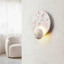 Load image into Gallery viewer, Inspira Lifestyles | Solace Travertine Wall Light – A natural travertine wall sconce designed to bring warmth, organic texture, and ambient lighting to contemporary interior spaces. Ideal as accent lighting in living rooms, bathrooms, stairwells, spas, and wellness-inspired environments. Natural stone wall lighting for both residential and commercial interiors.