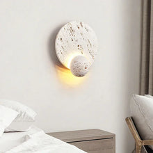 Load image into Gallery viewer, Inspira Lifestyles | Solace Travertine Wall Light – A natural travertine wall sconce designed to bring warmth, organic texture, and ambient lighting to contemporary interior spaces. Ideal as accent lighting in living rooms, bathrooms, stairwells, spas, and wellness-inspired environments. Natural stone wall lighting for both residential and commercial interiors.