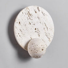 Load image into Gallery viewer, Inspira Lifestyles | Solace Travertine Wall Light – A natural travertine wall sconce designed to bring warmth, organic texture, and ambient lighting to contemporary interior spaces. Ideal as accent lighting in living rooms, bathrooms, stairwells, spas, and wellness-inspired environments. Natural stone wall lighting for both residential and commercial interiors.