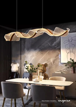 Load image into Gallery viewer, INSPIRA LIFESTYLES - Wave Modern Chandelier, ribbon-inspired chandelier, linear LED chandelier, dining room chandelier, kitchen island pendant light, sculptural architectural lighting