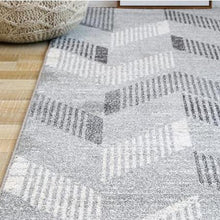 Load image into Gallery viewer, INSPIRA LIFESTYLES - Grey Chevrons Large Area Rug - AREA RUG, BEDROOM CARPET, CARPET, COMMERCIAL, DINING ROOM CARPET, FLOOR MAT, GEOMETRIC RUG, GRAY RUG, HOTEL CARPET, LIVING ROOM CARPET, MODERN RUG, MONOCHROME RUG, PILE CARPET, POLYESTER RUG, RECTANGLE AREA RUG, RUG, RUGS, WOVEN RUG