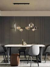 Load image into Gallery viewer, INSPIRA LIFESTYLES - Bubbles Linear Chandelier - ABSTRACT LIGHT, ACCENT LIGHT, BUBBLE CHANDELIER, CHANDELIER, GLASS GLOBE CHANDELIER, GLOBE CHANDELIER, LED CHANDELIER, LED PENDANT, LIGHT, LIGHT FIXTURE, LIGHTING, LIGHTS, MODERN CHANDELIER, MODERN PENDANT, PENDANT LIGHT, SCULPTURAL LIGHT