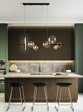 Load image into Gallery viewer, INSPIRA LIFESTYLES - Bubbles Linear Chandelier - ABSTRACT LIGHT, ACCENT LIGHT, BUBBLE CHANDELIER, CHANDELIER, GLASS GLOBE CHANDELIER, GLOBE CHANDELIER, LED CHANDELIER, LED PENDANT, LIGHT, LIGHT FIXTURE, LIGHTING, LIGHTS, MODERN CHANDELIER, MODERN PENDANT, PENDANT LIGHT, SCULPTURAL LIGHT