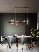 Load image into Gallery viewer, INSPIRA LIFESTYLES - Bubbles Linear Chandelier - ABSTRACT LIGHT, ACCENT LIGHT, BUBBLE CHANDELIER, CHANDELIER, GLASS GLOBE CHANDELIER, GLOBE CHANDELIER, LED CHANDELIER, LED PENDANT, LIGHT, LIGHT FIXTURE, LIGHTING, LIGHTS, MODERN CHANDELIER, MODERN PENDANT, PENDANT LIGHT, SCULPTURAL LIGHT