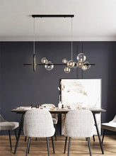 Load image into Gallery viewer, INSPIRA LIFESTYLES - Bubbles Linear Chandelier - ABSTRACT LIGHT, ACCENT LIGHT, BUBBLE CHANDELIER, CHANDELIER, GLASS GLOBE CHANDELIER, GLOBE CHANDELIER, LED CHANDELIER, LED PENDANT, LIGHT, LIGHT FIXTURE, LIGHTING, LIGHTS, MODERN CHANDELIER, MODERN PENDANT, PENDANT LIGHT, SCULPTURAL LIGHT