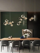 Load image into Gallery viewer, INSPIRA LIFESTYLES - Bubbles Linear Chandelier - ABSTRACT LIGHT, ACCENT LIGHT, BUBBLE CHANDELIER, CHANDELIER, GLASS GLOBE CHANDELIER, GLOBE CHANDELIER, LED CHANDELIER, LED PENDANT, LIGHT, LIGHT FIXTURE, LIGHTING, LIGHTS, MODERN CHANDELIER, MODERN PENDANT, PENDANT LIGHT, SCULPTURAL LIGHT
