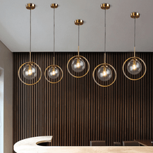 Load image into Gallery viewer, INSPIRA LIFESTYLES - Glass Globe Pendant Light - BEDROOM LIGHT, BEDSIDE LIGHT, BRASS, GLASS, HANGING LIGHT, LIGHT, LIGHT FIXTURE, LIGHTING, LIGHTS, LIVING ROOM LIGHT, MINIMAL, MODERN, PENDANT LIGHT