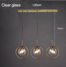 Load image into Gallery viewer, INSPIRA LIFESTYLES - Glass Globe Pendant Light - BEDROOM LIGHT, BEDSIDE LIGHT, BRASS, GLASS, HANGING LIGHT, LIGHT, LIGHT FIXTURE, LIGHTING, LIGHTS, LIVING ROOM LIGHT, MINIMAL, MODERN, PENDANT LIGHT