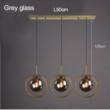 Load image into Gallery viewer, INSPIRA LIFESTYLES - Glass Globe Pendant Light - BEDROOM LIGHT, BEDSIDE LIGHT, BRASS, GLASS, HANGING LIGHT, LIGHT, LIGHT FIXTURE, LIGHTING, LIGHTS, LIVING ROOM LIGHT, MINIMAL, MODERN, PENDANT LIGHT