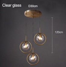 Load image into Gallery viewer, INSPIRA LIFESTYLES - Glass Globe Pendant Light - BEDROOM LIGHT, BEDSIDE LIGHT, BRASS, GLASS, HANGING LIGHT, LIGHT, LIGHT FIXTURE, LIGHTING, LIGHTS, LIVING ROOM LIGHT, MINIMAL, MODERN, PENDANT LIGHT