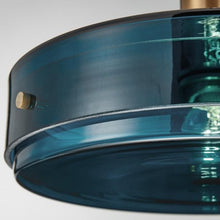 Load image into Gallery viewer, INSPIRA LIFESTYLES - Azura Blue Glass Pendant featuring translucent circular blue glass, modern sculptural pendant lighting with minimalist architectural design, ambient blue glass pendant for dining rooms, kitchen islands, bedrooms, living rooms, entryways, restaurants, boutique hotels, and luxury contemporary interiors