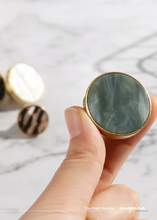 Load image into Gallery viewer, INSPIRA LIFESTYLES - Tos Knob Handles, brass cabinet knobs with decorative inlays, modern round drawer knobs for furniture, closets, wardrobes, and wall hook applications in contemporary interiors
