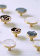 Load image into Gallery viewer, INSPIRA LIFESTYLES - Tos Knob Handles, brass cabinet knobs with decorative inlays, modern round drawer knobs for furniture, closets, wardrobes, and wall hook applications in contemporary interiors
