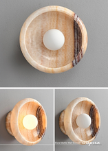 Load image into Gallery viewer, INSPIRA LIFESTYLES Elara Marble Wall Sconce natural jade onyx marble stone wall light circular stone wall sconce frosted globe diffuser modern architectural lighting spa bathroom wall light luxury hospitality wall lighting minimalist stone wall fixture
