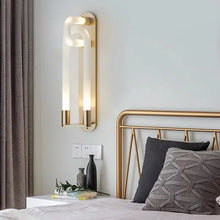 Load image into Gallery viewer, Inspira Lifestyles | Figaro Wall Sconce – Sculptural LED wall light with interlocking link design in brushed gold or matte black for modern and classic interiors
