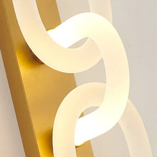 Load image into Gallery viewer, Inspira Lifestyles | Figaro Wall Sconce – Sculptural LED wall light with interlocking link design in brushed gold or matte black for modern and classic interiors
