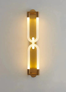 Inspira Lifestyles | Figaro Wall Sconce – Sculptural LED wall light with interlocking link design in brushed gold or matte black for modern and classic interiors