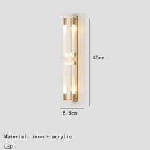 Load image into Gallery viewer, Inspira Lifestyles | Figaro Wall Sconce – Sculptural LED wall light with interlocking link design in brushed gold or matte black for modern and classic interiors
