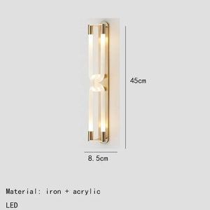 Inspira Lifestyles | Figaro Wall Sconce – Sculptural LED wall light with interlocking link design in brushed gold or matte black for modern and classic interiors