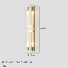 Load image into Gallery viewer, Inspira Lifestyles | Figaro Wall Sconce – Sculptural LED wall light with interlocking link design in brushed gold or matte black for modern and classic interiors
