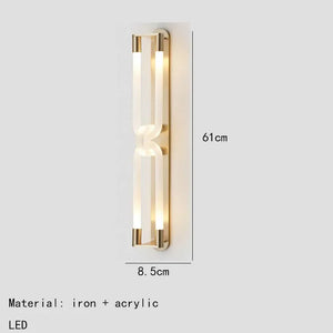 Inspira Lifestyles | Figaro Wall Sconce – Sculptural LED wall light with interlocking link design in brushed gold or matte black for modern and classic interiors