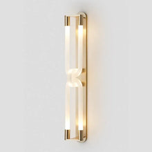 Load image into Gallery viewer, Inspira Lifestyles | Figaro Wall Sconce – Sculptural LED wall light with interlocking link design in brushed gold or matte black for modern and classic interiors
