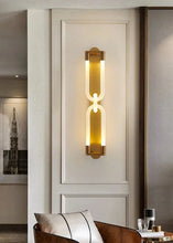 Load image into Gallery viewer, Inspira Lifestyles | Figaro Wall Sconce – Sculptural LED wall light with interlocking link design in brushed gold or matte black for modern and classic interiors
