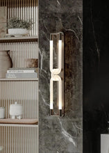 Load image into Gallery viewer, Inspira Lifestyles | Figaro Wall Sconce – Sculptural LED wall light with interlocking link design in brushed gold or matte black for modern and classic interiors
