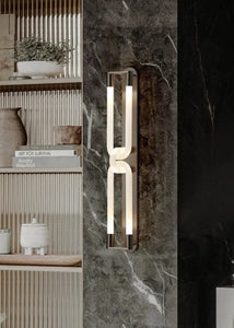 Inspira Lifestyles | Figaro Wall Sconce – Sculptural LED wall light with interlocking link design in brushed gold or matte black for modern and classic interiors