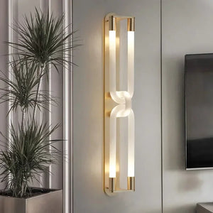 Inspira Lifestyles | Figaro Wall Sconce – Sculptural LED wall light with interlocking link design in brushed gold or matte black for modern and classic interiors