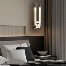 Load image into Gallery viewer, Inspira Lifestyles | Figaro Wall Sconce – Sculptural LED wall light with interlocking link design in brushed gold or matte black for modern and classic interiors
