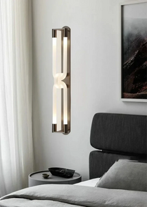 Inspira Lifestyles | Figaro Wall Sconce – Sculptural LED wall light with interlocking link design in brushed gold or matte black for modern and classic interiors