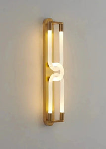 Inspira Lifestyles | Figaro Wall Sconce – Sculptural LED wall light with interlocking link design in brushed gold or matte black for modern and classic interiors