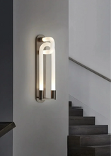 Load image into Gallery viewer, Inspira Lifestyles | Figaro Wall Sconce – Sculptural LED wall light with interlocking link design in brushed gold or matte black for modern and classic interiors
