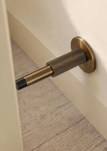 Load image into Gallery viewer, INSPIRA LIFESTYLES - Knurled Wall Door Stops with crisscross diamond-pattern detailing, adjustable length and rubber cushion pads in Matte Black, Satin Brass, Bright Chrome and Antique Bronze.
