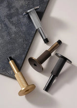 Load image into Gallery viewer, INSPIRA LIFESTYLES - Knurled Wall Door Stops with crisscross diamond-pattern detailing, adjustable length and rubber cushion pads in Matte Black, Satin Brass, Bright Chrome and Antique Bronze.
