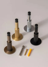 Load image into Gallery viewer, INSPIRA LIFESTYLES - Knurled Wall Door Stops with crisscross diamond-pattern detailing, adjustable length and rubber cushion pads in Matte Black, Satin Brass, Bright Chrome and Antique Bronze.
