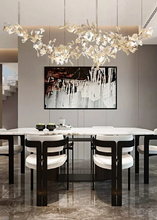 Load image into Gallery viewer, INSPIRA LIFESTYLES - Sculptural Leaf Chandelier, porcelain ginkgo chandelier, cascading porcelain leaf light, gold canopy chandelier, modern statement ceiling light, dining room chandelier, kitchen island pendant light, living room accent lighting, stairwell chandelier, contemporary sculptural light fixture, minimalist gold chandelier, transitional interior lighting, luxury porcelain chandelier, designer lighting fixture
