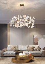 Load image into Gallery viewer, INSPIRA LIFESTYLES - Sculptural Leaf Chandelier, porcelain ginkgo chandelier, cascading porcelain leaf light, gold canopy chandelier, modern statement ceiling light, dining room chandelier, kitchen island pendant light, living room accent lighting, stairwell chandelier, contemporary sculptural light fixture, minimalist gold chandelier, transitional interior lighting, luxury porcelain chandelier, designer lighting fixture
