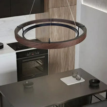 Load image into Gallery viewer, INSPIRA LIFESTYLES – Anello Duo Chandelier – sculptural two-tier chandelier with wood-patterned ring and matte black ring. Modern LED light fixture for dining rooms, living rooms, stairwells, offices, and transitional interiors.
