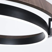 Load image into Gallery viewer, INSPIRA LIFESTYLES – Anello Duo Chandelier – sculptural two-tier chandelier with wood-patterned ring and matte black ring. Modern LED light fixture for dining rooms, living rooms, stairwells, offices, and transitional interiors.
